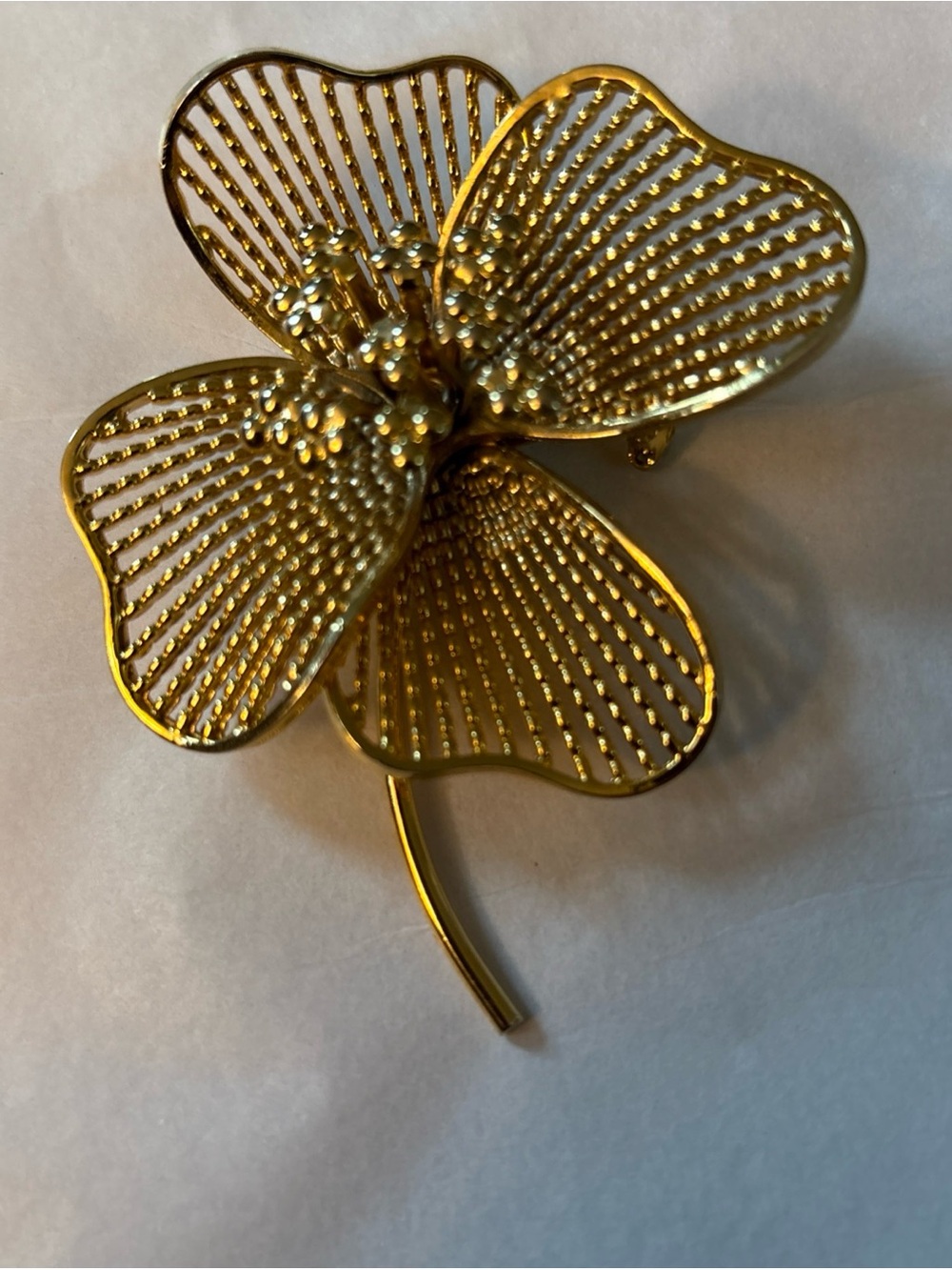 Gold Tone  4 Leaf Clover or flower brooch. Approximately 3 inches.